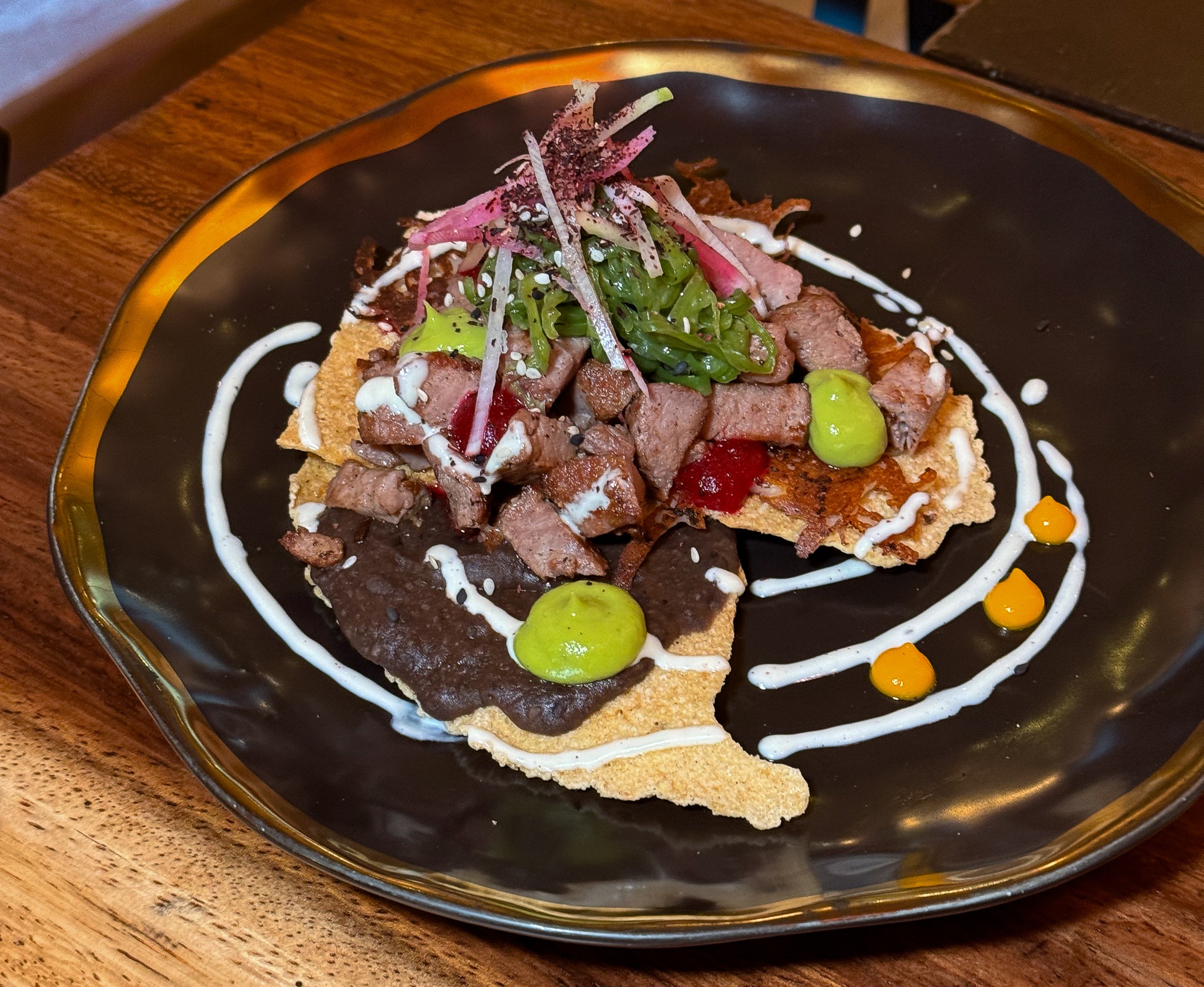 Tlayudas - Tostada Flank Steak w refried beans Mezcal & Sal Puerto Vallarta